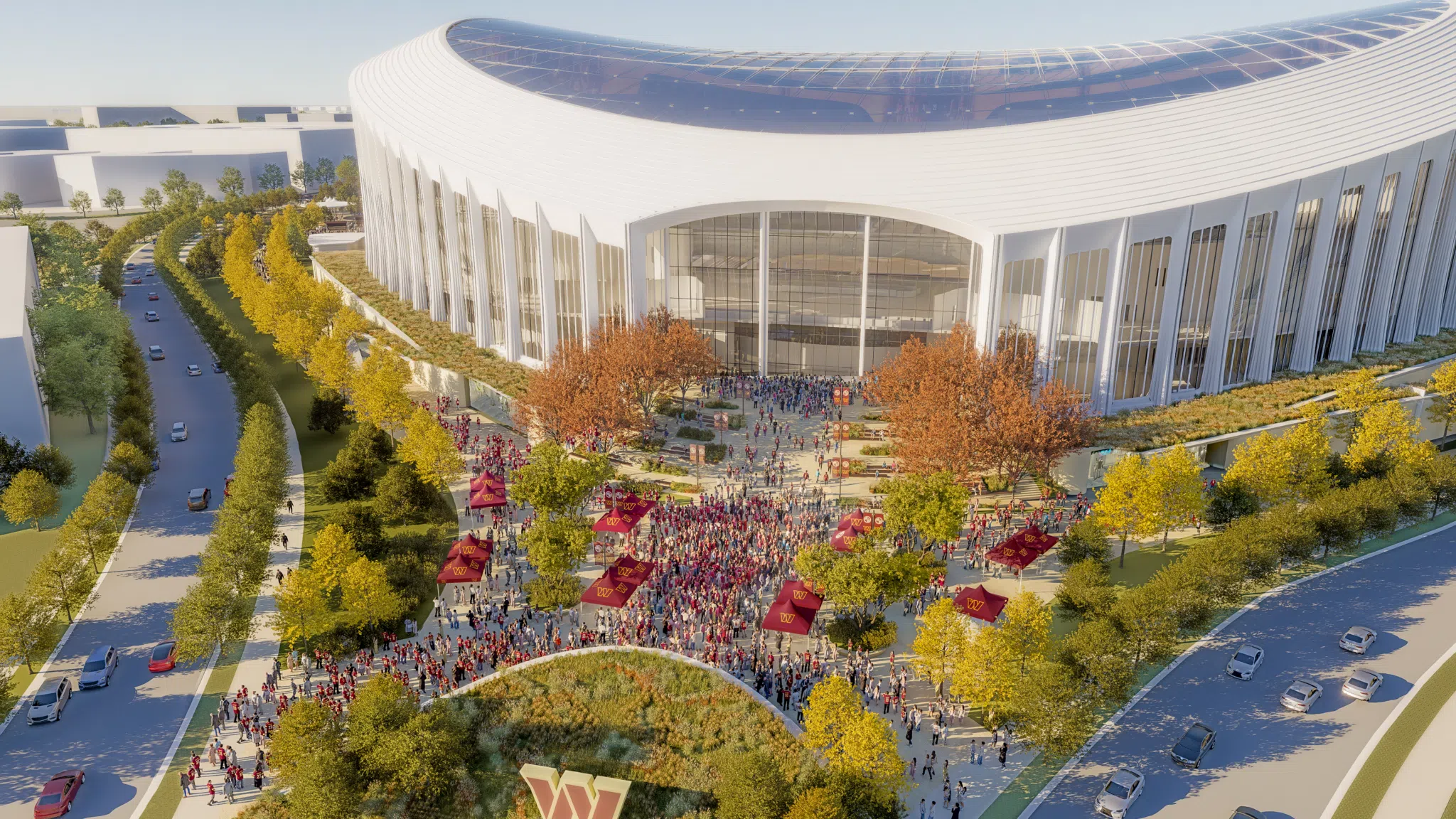 Aerial view of the Washington Commanders stadium east plaza, with tree-lined approaches and fan gatherings in a public realm landscape designed by OJB.